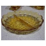This is a collection of vintage Anchor Hocking Fairfield pattern amber glass dishes.