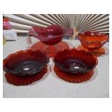 The items in the image are vintage Anchor Hocking Royal Ruby red glass bowls