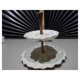 This is a vintage two-tiered server, possibly from Maddux of California