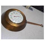 This is a vintage copper kitchen thermometer