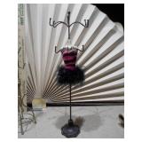 These are various metal and mannequin jewelry display stands and holders.