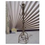 These are various metal and mannequin jewelry display stands and holders.