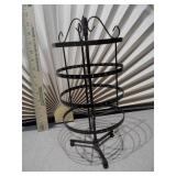 These are various metal and mannequin jewelry display stands and holders.