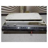This is a vintage Precisa mechanical kitchen or balance scale