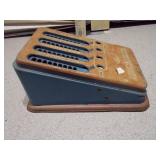 This is a vintage tin litho toy adding machine,