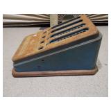 This is a vintage tin litho toy adding machine,