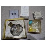 The collection includes various sizes, shapes, and colors of glass bottles