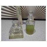 The collection includes various sizes, shapes, and colors of glass bottles