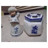 The image displays a collection of Delft blue and white ceramic items
