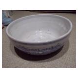 The image displays a collection of Delft blue and white ceramic items