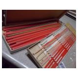 The image displays a lot of assorted vintage and antique collectibles