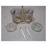 This is a vintage mid-century modern Jeannette Glass Co. condiment set with a gold-tone caddy.