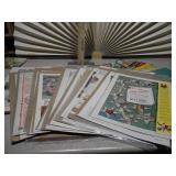 The image shows a collection of assorted vintage print ephemera