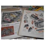 The image shows a collection of assorted vintage print ephemera