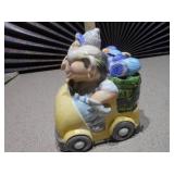 The image displays several collectible figurines