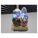 The image displays several collectible figurines