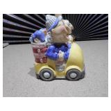 The image displays several collectible figurines