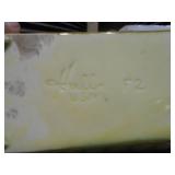 The image features several ceramic planters,