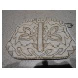 These are vintage beaded clutch purses,