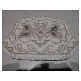 These are vintage beaded clutch purses,