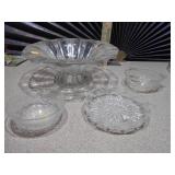 The image features a collection of vintage pressed glass bowls