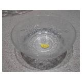 The image features a collection of vintage pressed glass bowls