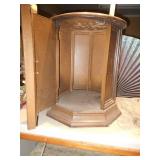 The item in the image is the BASE of an octagonal (or hexagonal) curio cabinet