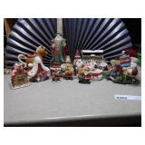 This is a lot of assorted Santa Claus figurines