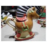 This is a lot of assorted Santa Claus figurines