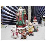 This is a lot of assorted Santa Claus figurines