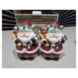 This is a lot of assorted Santa Claus figurines