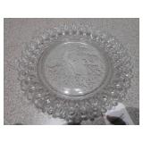 This is a collection of vintage or antique clear glass dishes