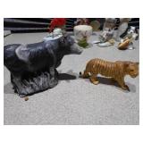 The image displays a collection of various ceramic figurines