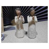 The image displays a collection of various ceramic figurines