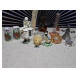This is a collection of assorted vintage porcelain and ceramic figurines and home decor items.