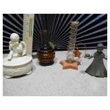 This is a collection of assorted vintage porcelain and ceramic figurines and home decor items.