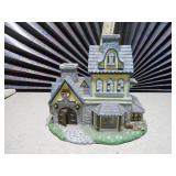 This is a PartyLite Olde World Village Candle Shoppe Tealight House