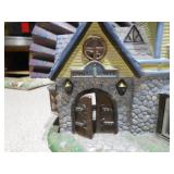 This is a PartyLite Olde World Village Candle Shoppe Tealight House