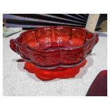 The image displays a collection of ruby red glass collectible items,