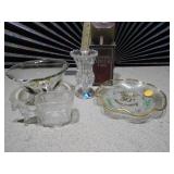 This image displays a collection of glass items,