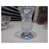 This image displays a collection of glass items,