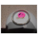 These are vintage Chinese porcelain or ceramic bowls with floral motif