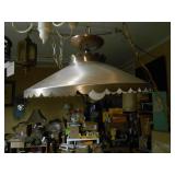 This is a vintage 1950s metal hanging pendant light with a wide scalloped hood