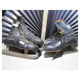 These are vintage black leather ice skates