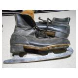 These are vintage black leather ice skates
