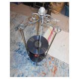 This is a vintage wrought iron two-tier stand