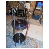 This is a vintage wrought iron two-tier stand