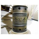 This is an antique wooden wagon wheel hub table lamp