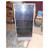 This is a vintage industrial steel mobile display cabinet