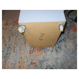 This is a vintage industrial steel mobile display cabinet